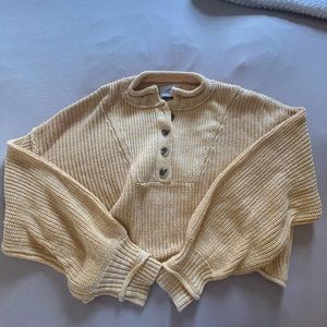 Urban Outfitters yellow cropped knit sweater size M.